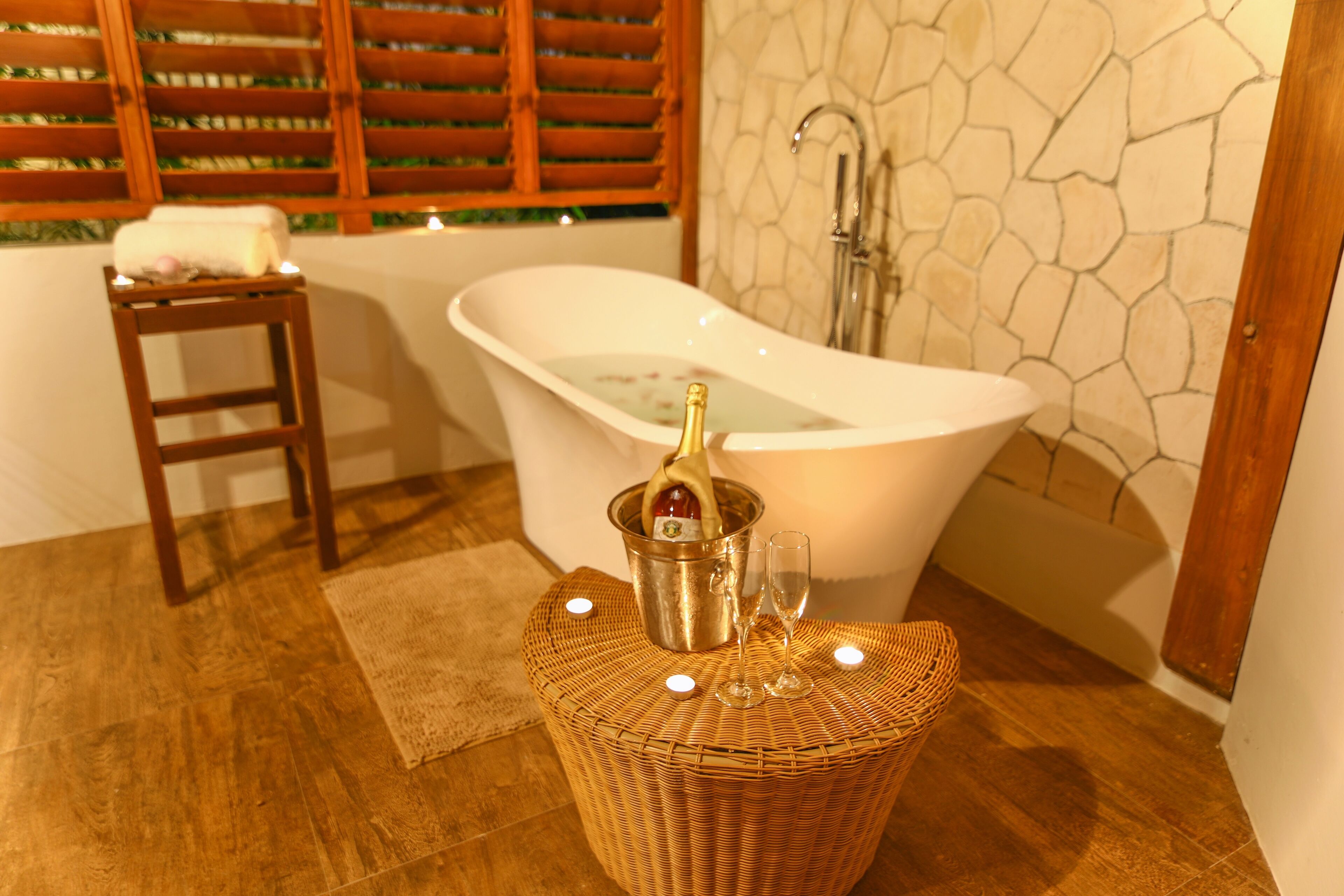 A bathtub in the bathroom.