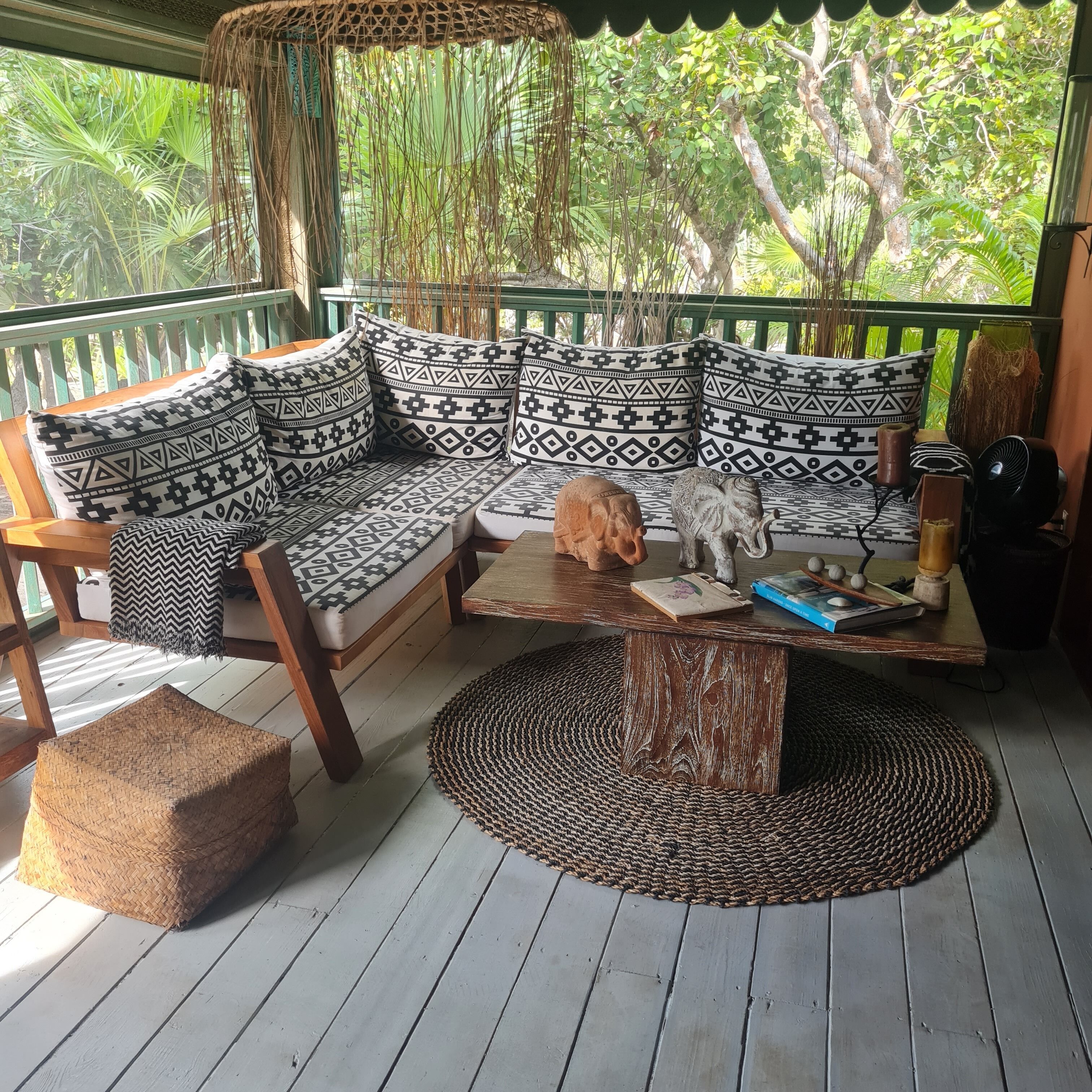 A corner sofa on the screened porch.