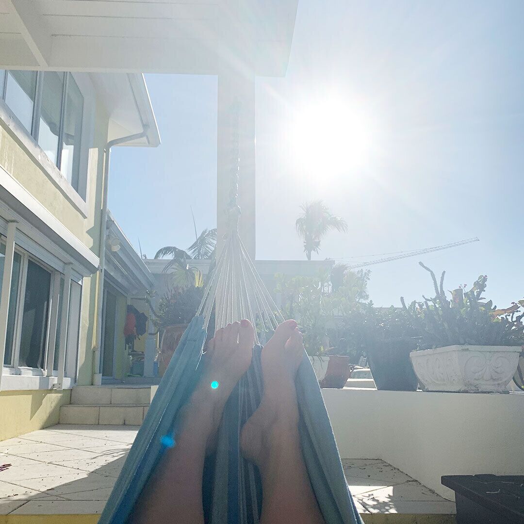 A view from a hammock on the terrace of the house.