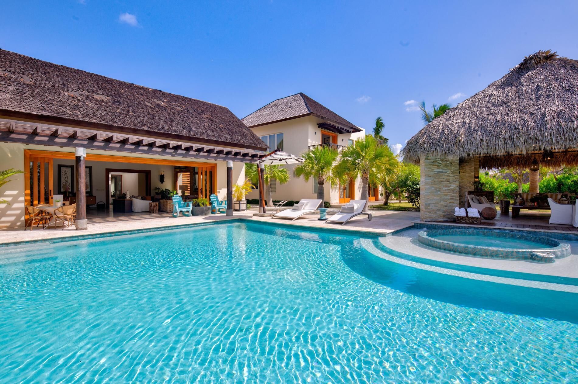 The private pool and the hot tub between the covered terrace and the gazebo.