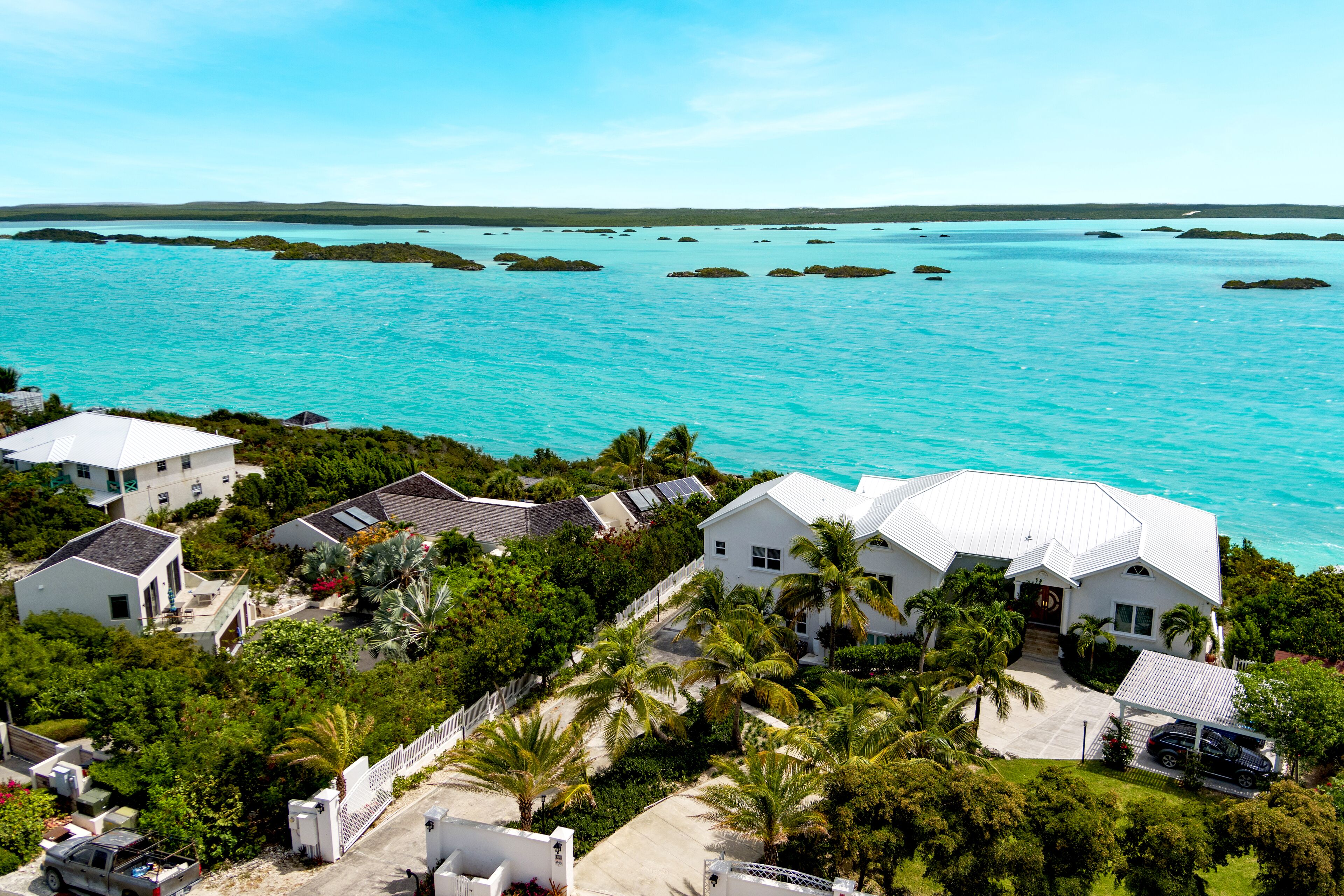 An aerial view of the villa at the edge of the Chalk Sound lagoon.