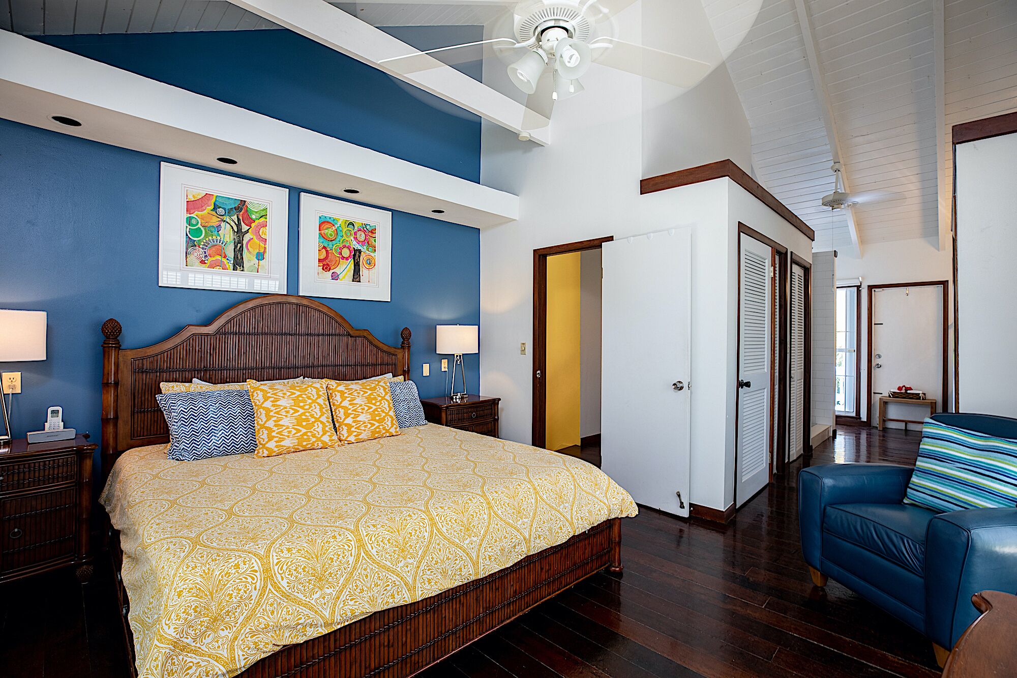A bedroom with a king bed.