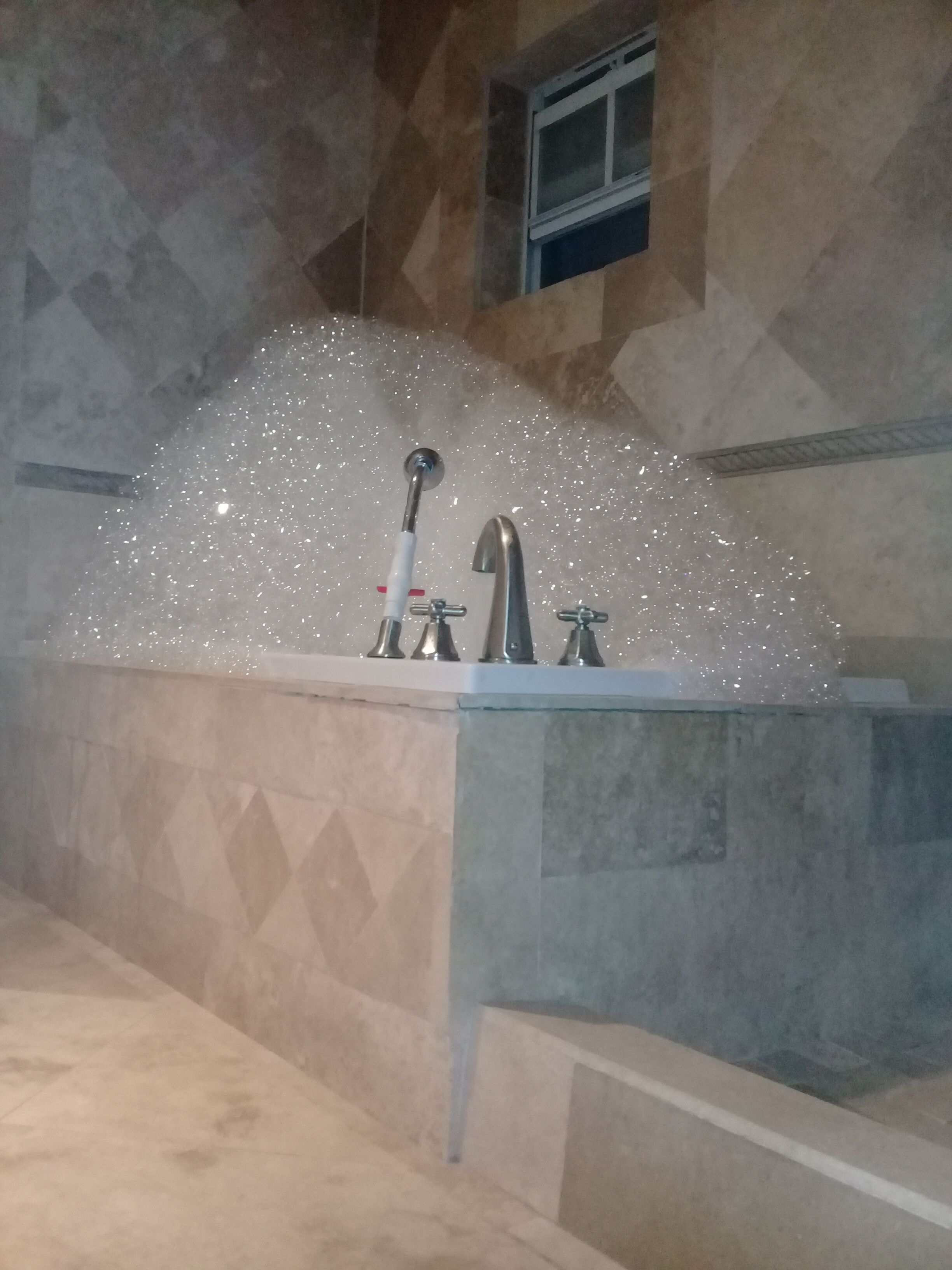 A bathtub with foam.