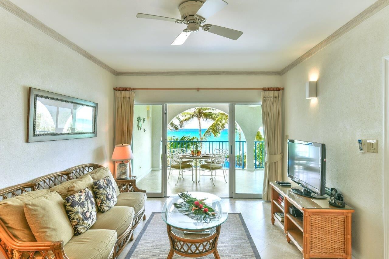 The living room, with the balcony and the sea beyond.
