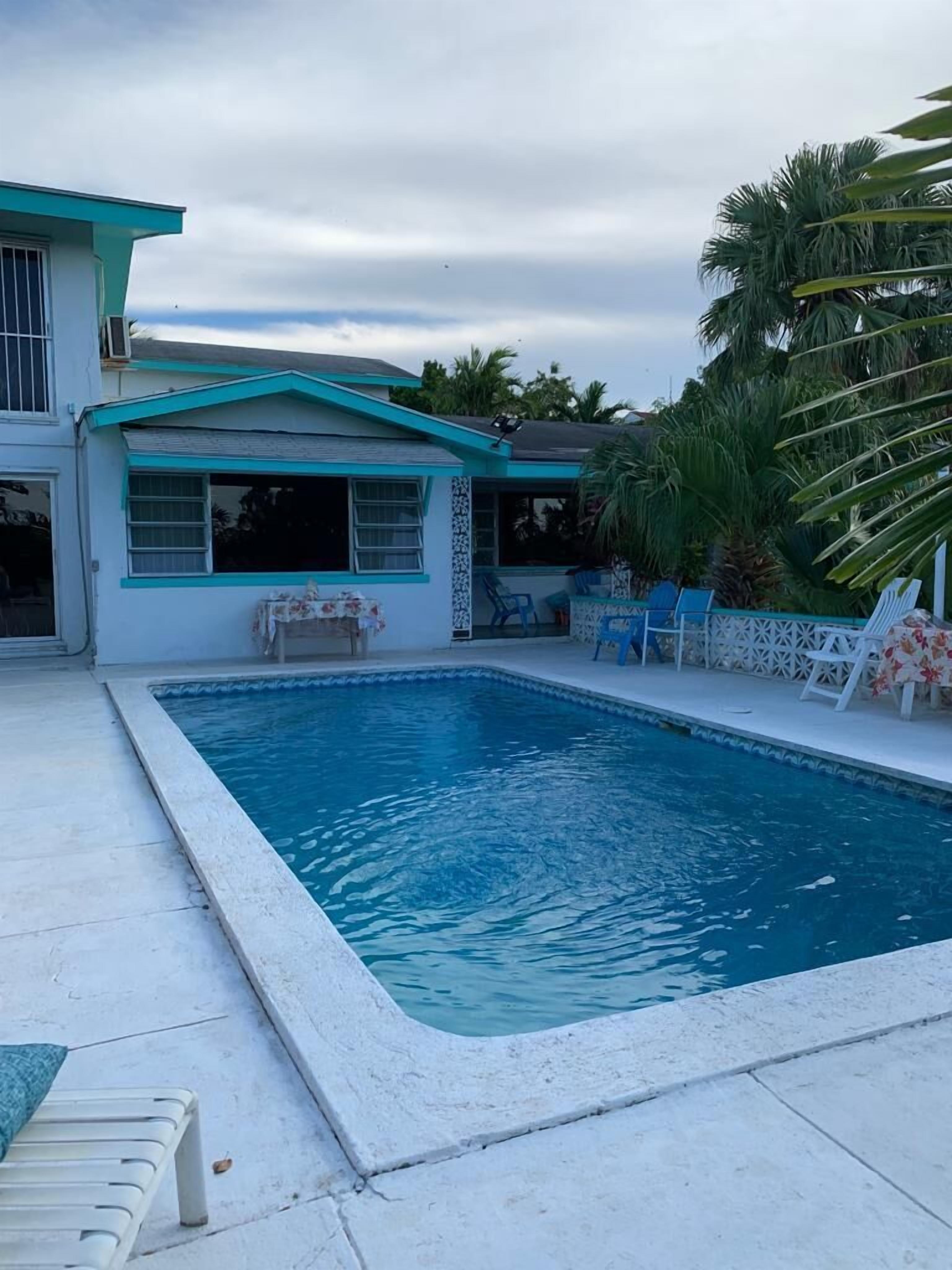 The pool behind the house.