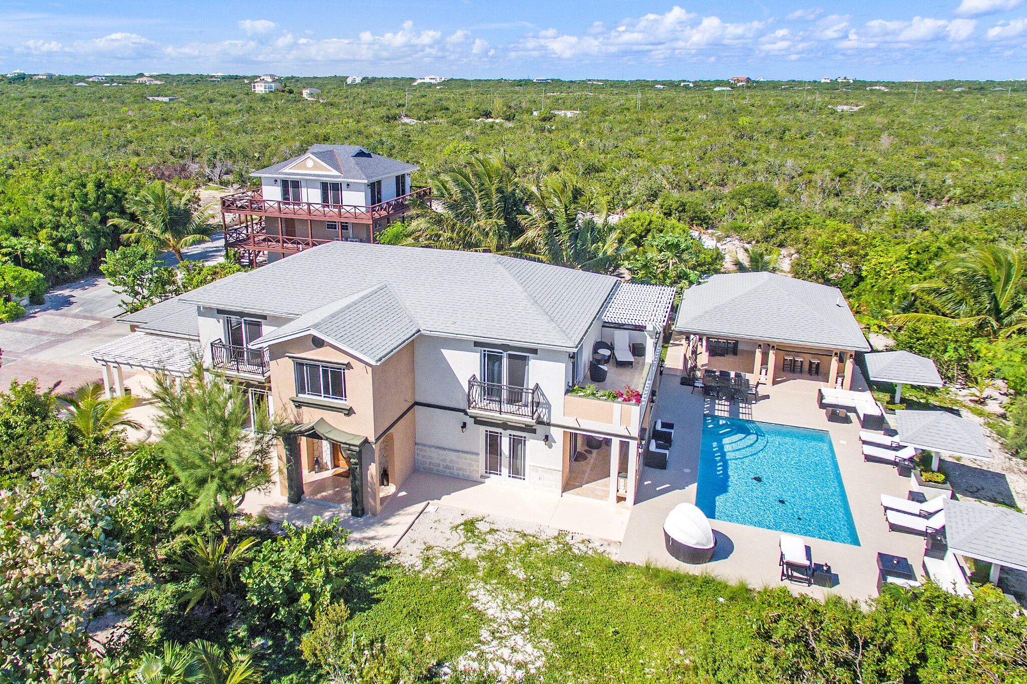 The villa and the pool from above.