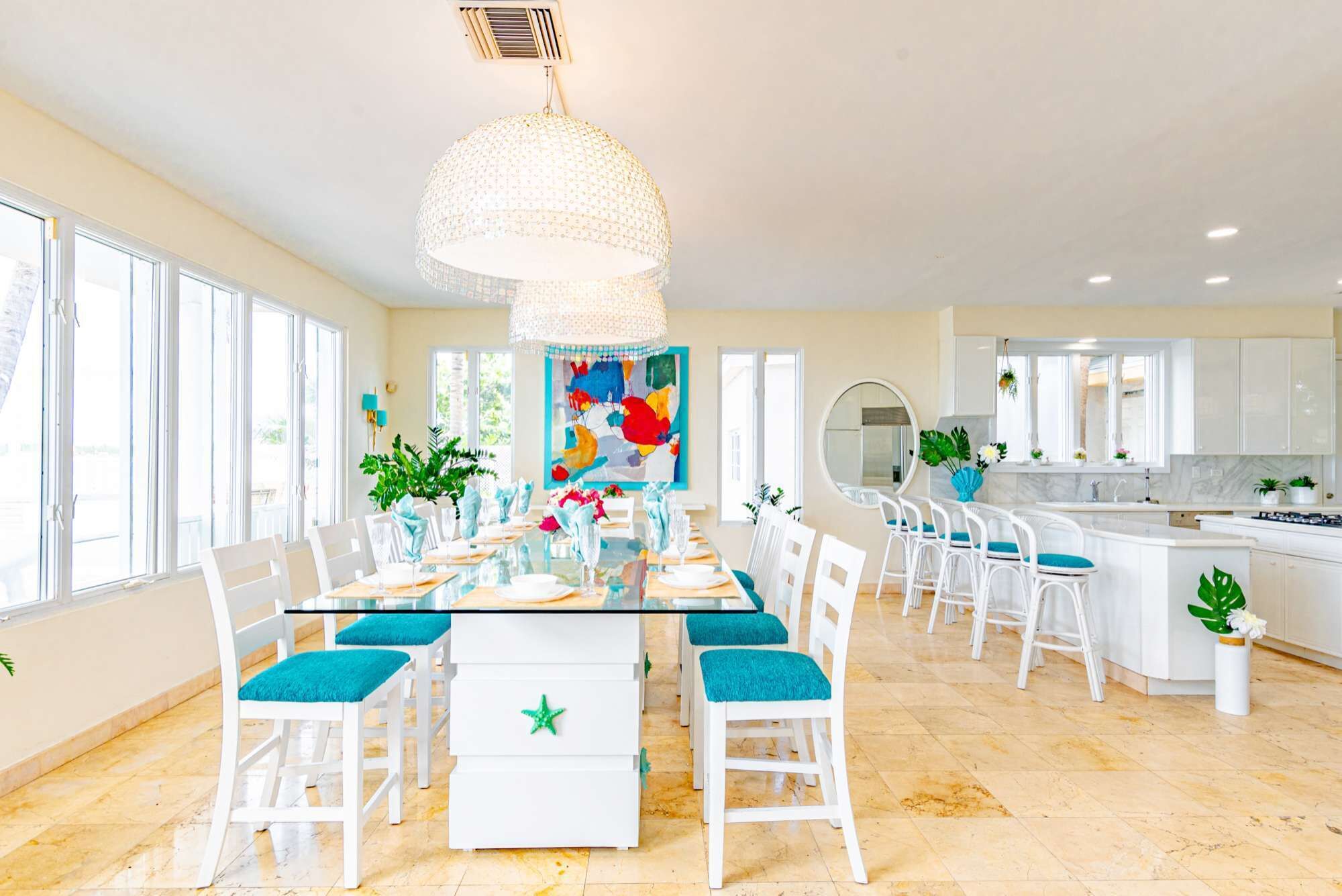 The dining table and the kitchen bar.