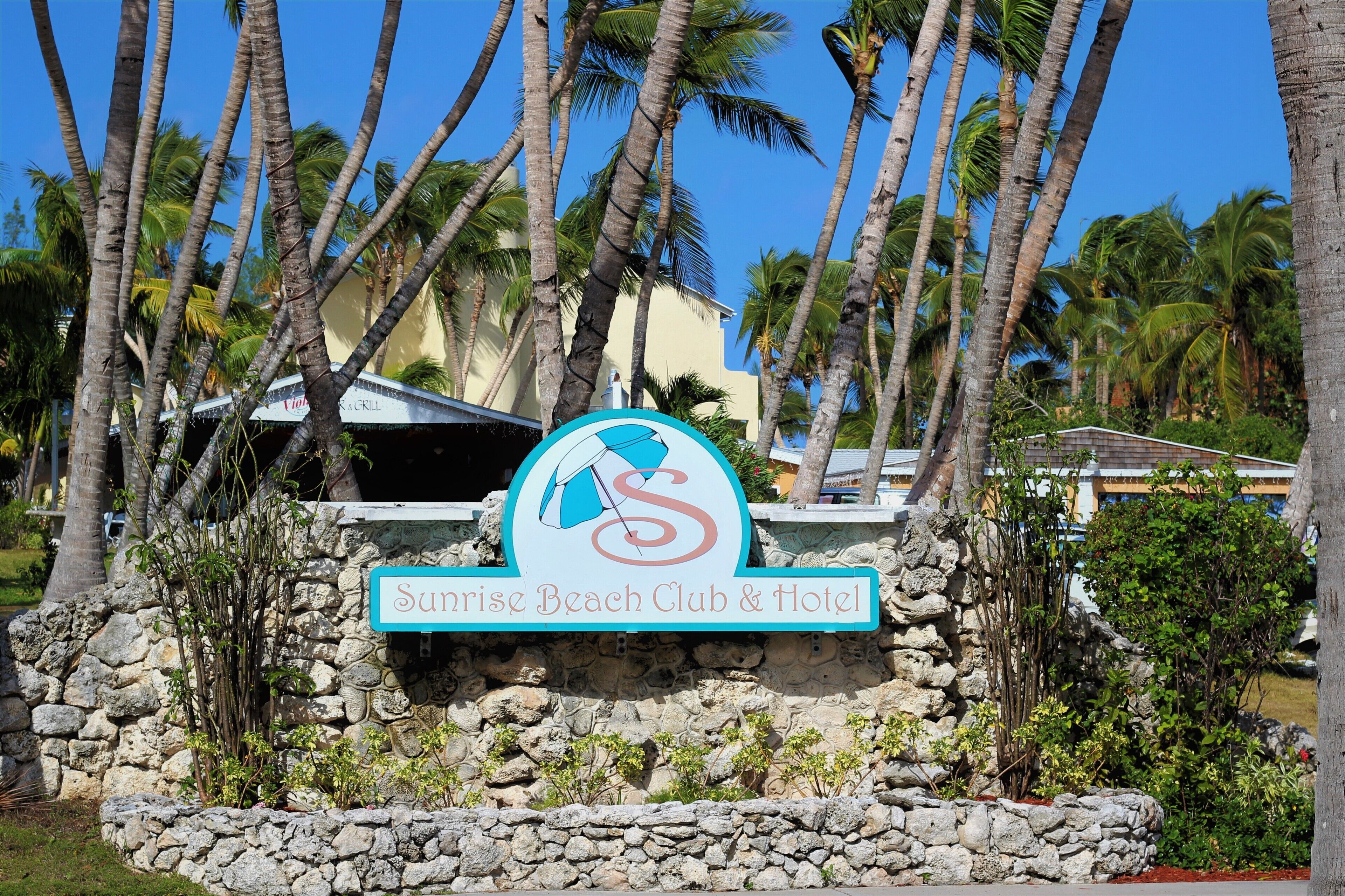 The entrance sign of the Sunrise Beach Club and Hotel.