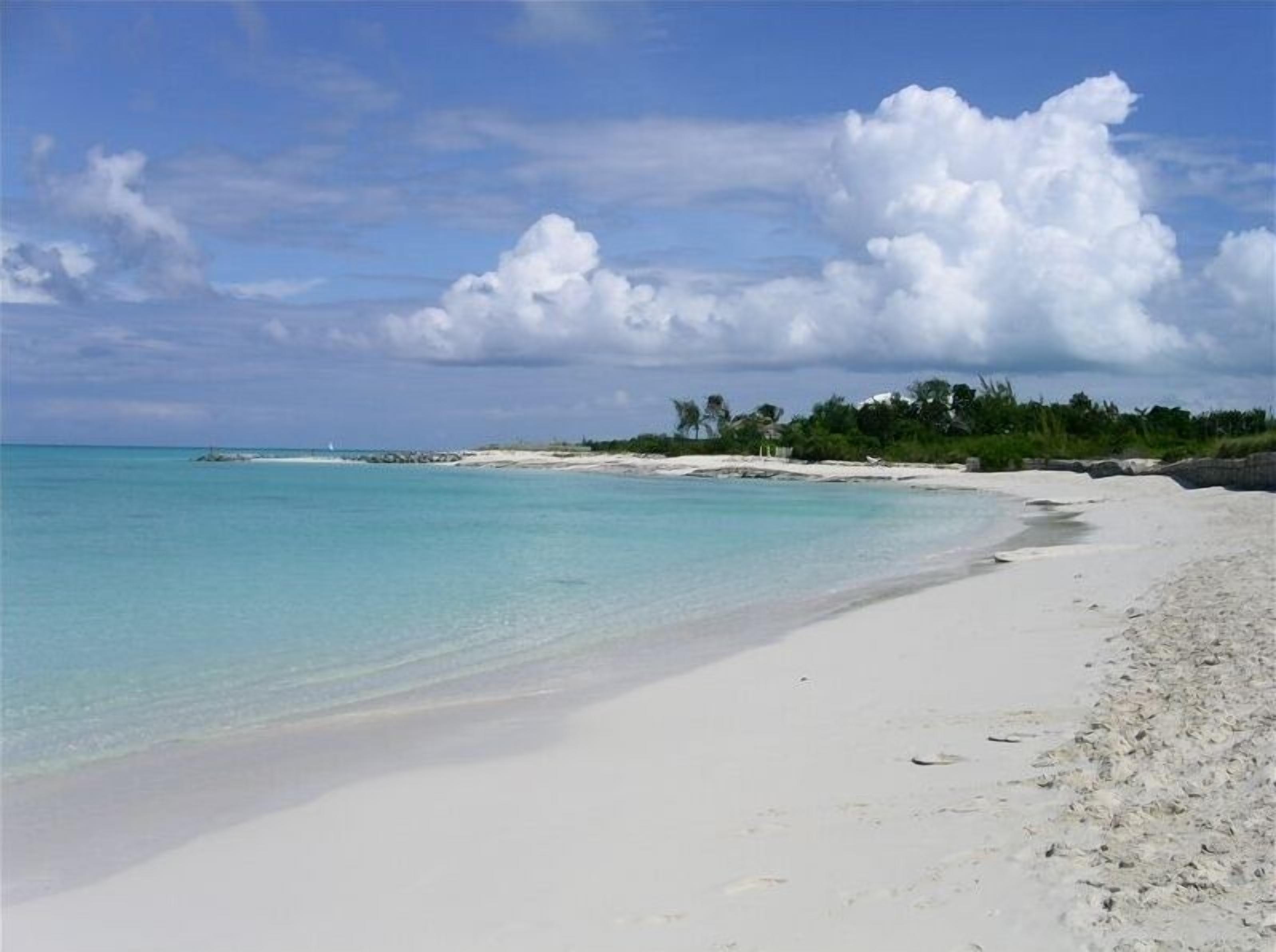 A white sand beach and turquoise water.